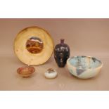A collection of studio pottery, including a circular plate by Ljerka Njers, 25cm diameter, a small
