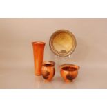 Four items of studio pottery, comprising two ceramic jars of differing sizes by David Henderson,