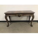 A 19th century Italian walnut console table, 156cm wide, with nice carved lion mask to centre and