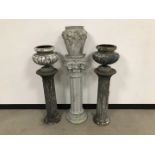 A pair of vintage cast iron pillars with flower pots, AF, 102cm high, together with a grey painted