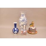 A group of four early 20th century Chinese ceramic items, including one large blue and whit vase,