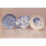 Two 19th century Delft pottery items, the charger restored, and a vase, signed, together with a