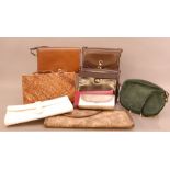 A collection of ladies handbags and clutches, including a bag by Christian Dior (AF), a leather