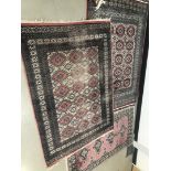Three 20th century Middle Eastern woollen carpets, AF, largest 180cm by 128cm (3)