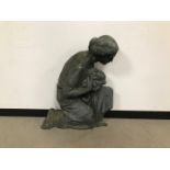 A 20th century bronze garden statue, 84cm high and 71cm wide, modelled as woman kneeling with