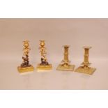 Two pairs of late 19th century brass candle sticks, one pair with Stag and Roa figures 20.5cm