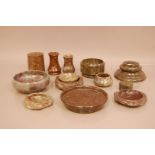 A group of Victorian and later carved granite items, including an inkwell, two vases, a covered