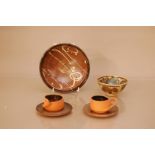 A collection of studio pottery, including a two bowls of differing sizes, the larger one 17cm in