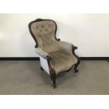 A Victorian walnut armchair