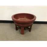 A vintage Chinese red lacquered planter, 54cm diameter