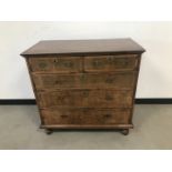 A George III oak and walnut chest of drawers, 96cm wide