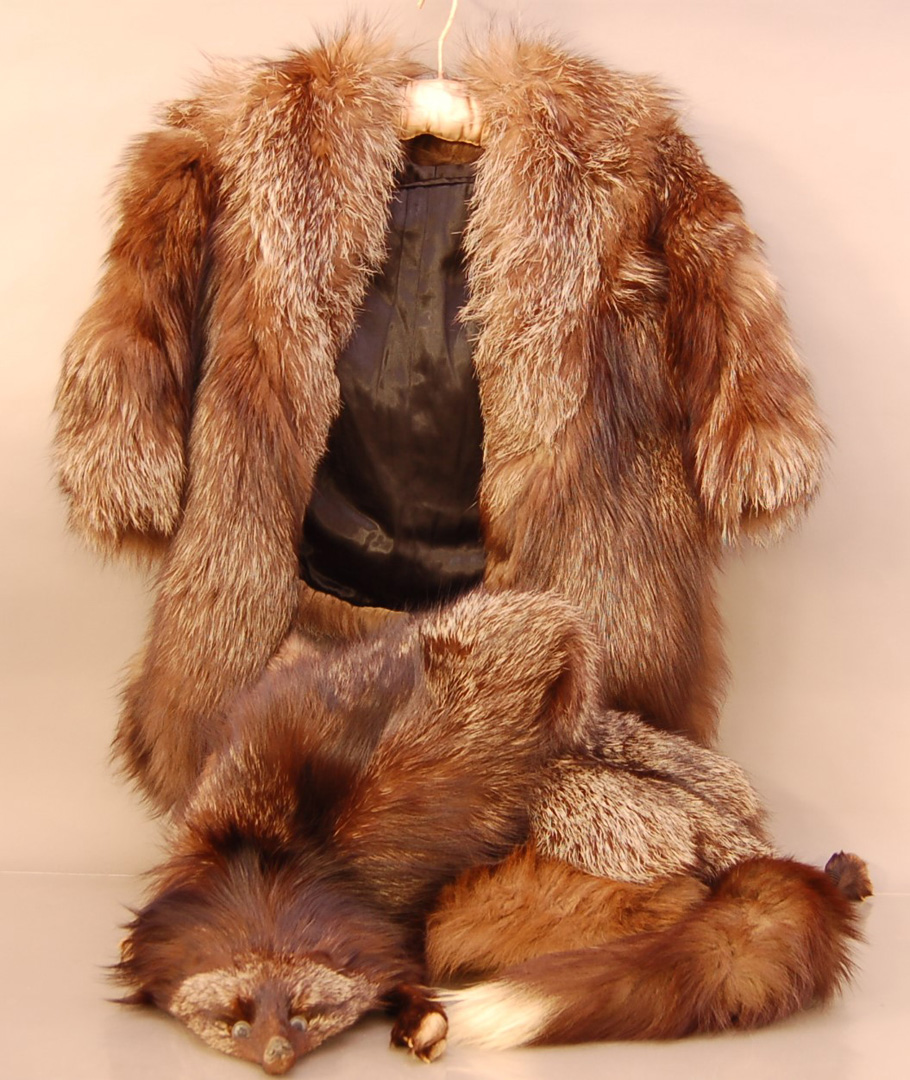 A collection of fur items, comprising a silver fox coat and shawl, together with two other fur