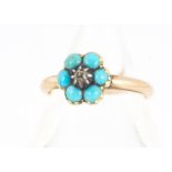 An early 19th century turquoise and diamond posy ring, the flower head centred with a rough cut
