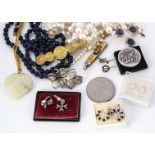 A collection of costume jewels, including two stick pins, beads and simulated pearls (a parcel)