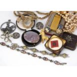 A collection of costume jewellery, including an Art Deco paste cocktail watch, a simulated coral