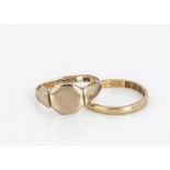 A 22ct wedding band, flattened form ring size L, 1.7g, a 9ct gold signet ring size L, 2g