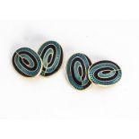 A pair of 18ct gold and enamel oval cufflinks, the blue and turquoise design, with engine turned