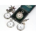 Four late 19th and early 20th century white metal and silver ladies pocket watches, one in case with