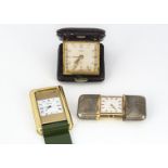 An Art Deco style Movado purse watch, sadly lacking covering, probably once shagreen, appears to