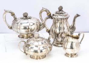 A good George IV silver four piece tea set by William Eaton, comprising melon shaped teapot, covered