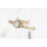 A diamond 18ct gold solitaire, the brilliant cut in rubbed over setting, ring size N1/2, diamond 0.