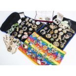 A collection of costume brooches, some of Celtic design, a collection of fresh water cultured