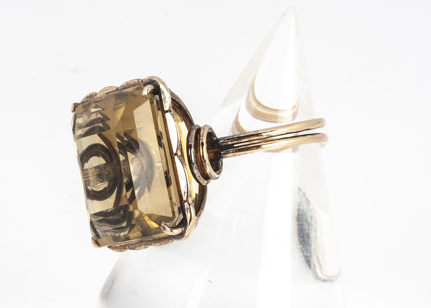 A citrine and gold dress ring, the mixed square cut, in a claw setting on a pierced basket, on a - Image 3 of 3