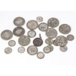 A collection of British and European coins, with several pre-1946 half crowns and others, along with