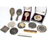 A group of Art Deco period compacts and other vanity items, including a Japanese small hand mirror