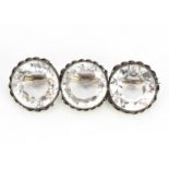 A 19th century rock crystal brooch, the three circular cut stones within a silver frame, having