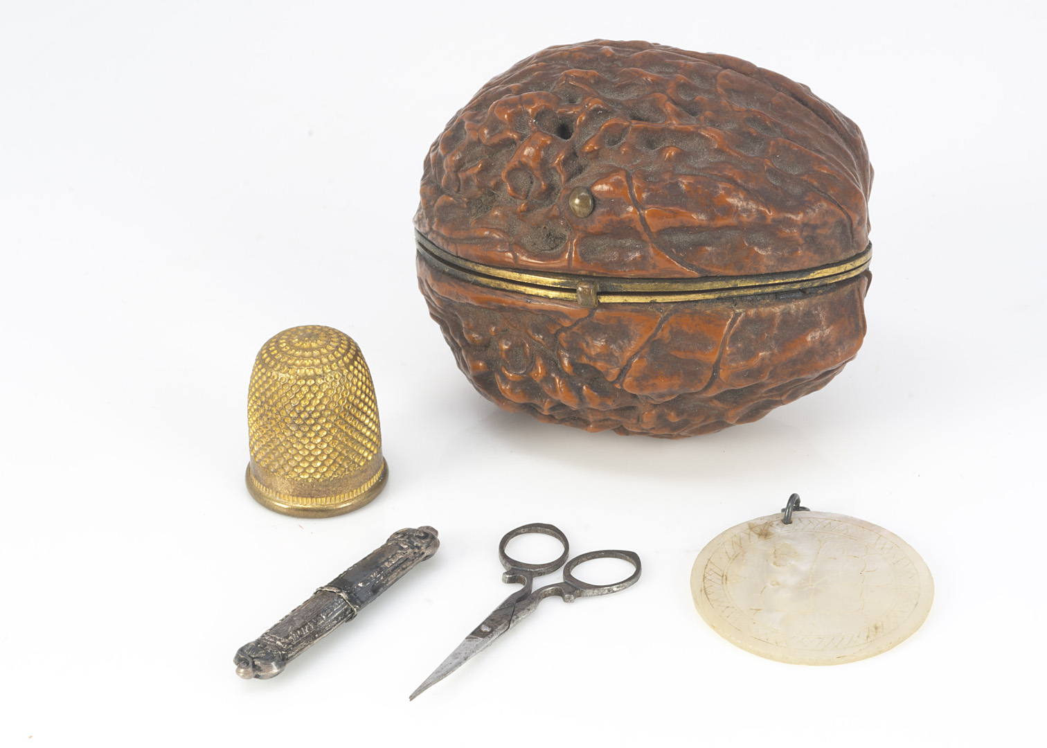 A 19th century walnut sewing etui, the gilt fitted interior containing miniature scissors, - Image 2 of 3