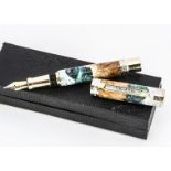 A modern craftsman made Burr-Elm fountain pen, with resin, silver plated and brass decoration,