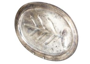 A mid 20th century Japanese white metal meat dish by K. Uyeda, 36.2 ozt and 45cm wide, feet bent,