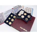 A large collection of British coins, along with European and World coinage, in two boxes, with