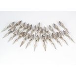 A set of 24 mid 20th century Far Eastern white metal sweetcorn spikes