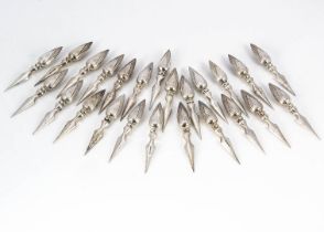 A set of 24 mid 20th century Far Eastern white metal sweetcorn spikes
