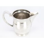 A 20th century white metal jug, probably once a tankard, 11.5cm high and 10.7 ozt