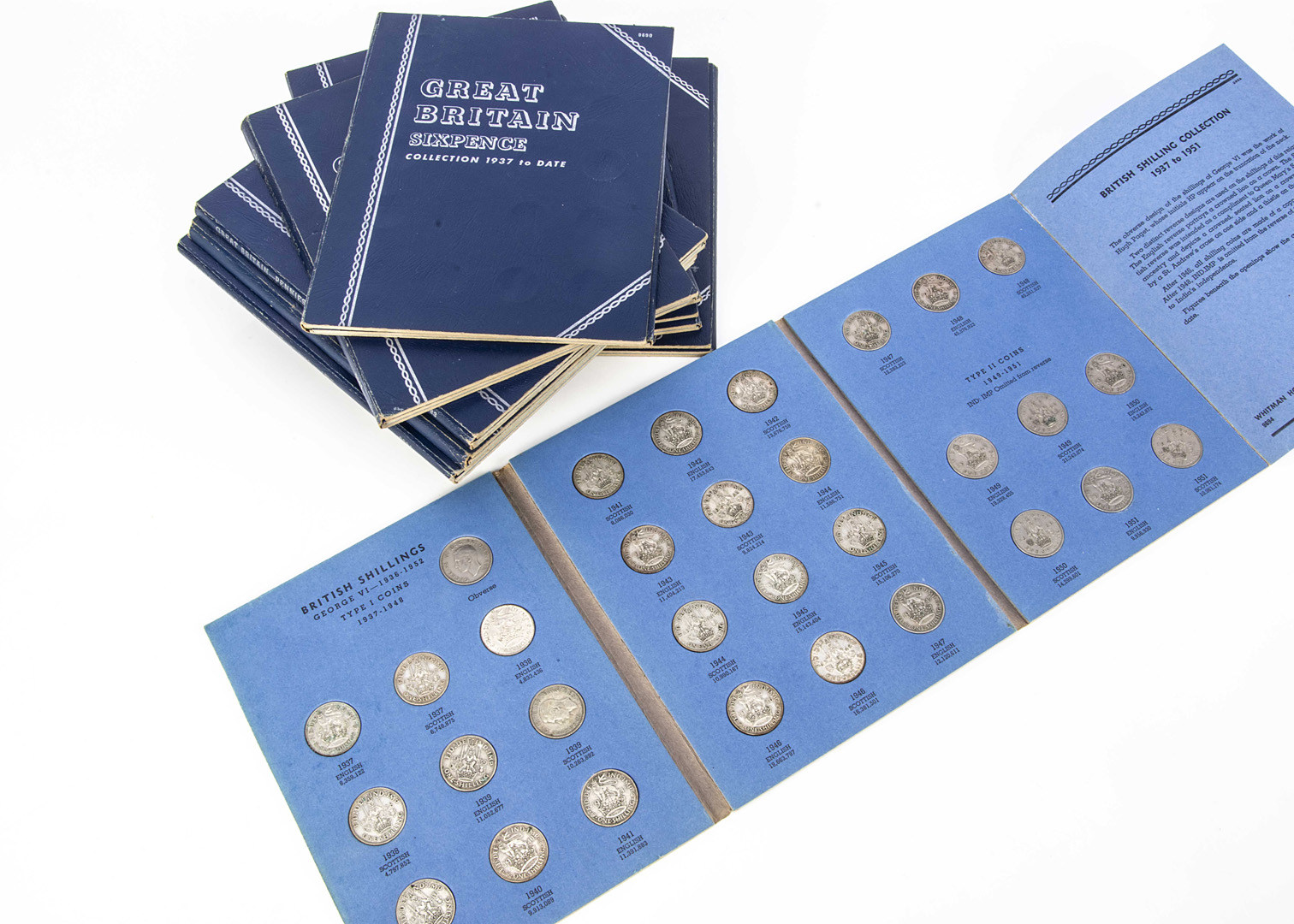 A collection of British coins, presented in several blue coin collectors folders, some George V