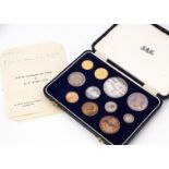 A 1953 South African eleven coin proof like coin set, in fitted box, containing a gold £1 (8g) and a