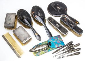 A collection of dressing table items, including a 1920s tortoiseshell and pique hand mirror, pair of