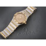 A 1990s Omega Constellation lady's stainless steel wristwatch, 25mm case with gilt bezel and gilt