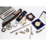 A mixed lot of collectables, including a modern silver paper knife, a silver plated bosun's whistle,