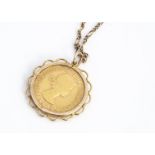 An Elizabeth II full sovereign mount and chain, dated 1965, crimped rim with curbed linked chain,