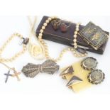 A collection of costume jewels, including a marcasite double clip brooch, a 9ct gold cross pendant