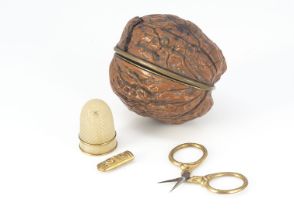A 19th century walnut sewing etui, AF, with hinged but and fitted interior, incomplete with mop