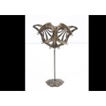 An Art Nouveau style white metal jewellery stand, 14.5cm, marked 925