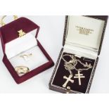 A 9ct gold wedding band, D shaped ring size T, 4.1g together with 9ct gold cross pendant and chain