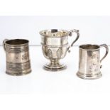 Three Victorian and later silver Christening tankards, 12.2 ozt, some with dents, the largest