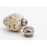 A Macintyre Saunders and Shepherd ceramic and silver egg scent bottle, the ovoid cream body with