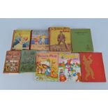 Various childrens annuals and books, including Andersen's Fairy Tales, Ajax Adventure Annual, Enid